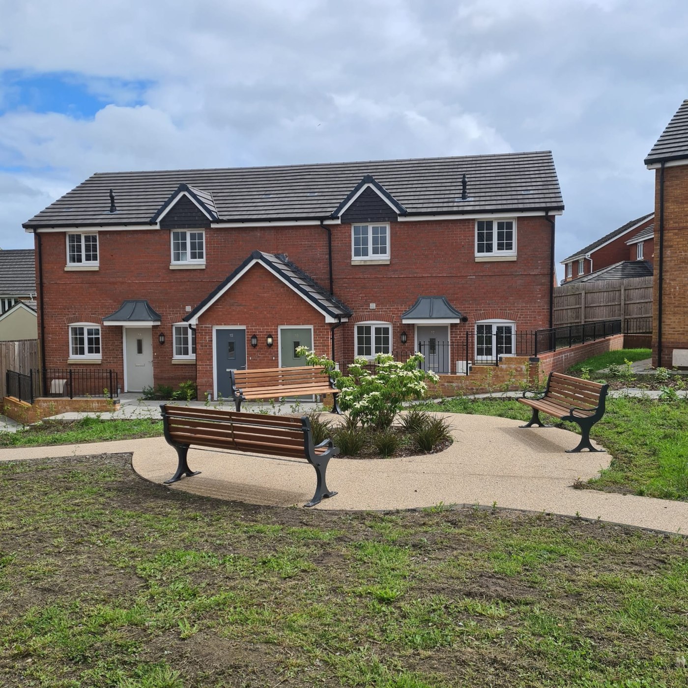 Homes and shared landscaped seating area